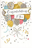 The photo displays a joyful congratulations card whose design feels like a celebration captured in still life, much like a vibrant bouquet ready to leave a Willesden Florist workbench. At the centre, an airy cluster of balloons is illustrated in a balanced mix of metallic and pastel tones-soft gold, shimmering silver, champagne, light sky blue, rosy blush pink, and gentle grey. The balloons overlap naturally, with some sitting clearly in the foreground while others recede, giving a three-dimensional sense of depth and lift, as though they're just about to float off the page. Each balloon shows a different ornate pattern: dainty stars sprinkled across the surface, fine stripes circling the curves, or glitter-like speckles that suggest a tactile sparkle. Cutting gracefully through the middle is a banner bearing the phrase "Congratulations To You" in elegant, curling calligraphy that conveys genuine warmth and respect. Around this central motif, a scattering of tiny stars, swirling ribbons, and confetti dots drifts across a soft, light background, echoing the playful movement of decorations at a cosy gathering in Willesden or nearby Kensal Rise. The card's mood is upbeat but polished, making it ideal for honouring achievements such as exam results, new roles, or personal milestones. From a florist's eye, the gentle metallic glow and pastel accents make it a beautiful partner for everything from understated white-and-cream arrangements to brighter celebratory blooms, helping to express heartfelt congratulations with style and sincerity.