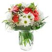 This dazzling bouquet, reminiscent of the lively atmosphere along Willesden High Road, radiates a blend of cheerful warmth and refined simplicity. At its heart, lush coral-pink carnations create a textured focal point, their ruffled petals bursting with character and joyful energy. Around them, crisp white daisies and multi-petaled chrysanthemums with golden-green centers reflect the clarity and tranquility of open mornings in Willesden. Baby's breath drifts in dreamy clouds between the blooms, giving the composition a softness akin to the gentle breezes in Roundwood Park. Encasing the florals, glossy and matte green leaves ground the display in natural beauty, mirroring the area's vibrant garden spaces. The bouquet sits proudly in a clear glass vase, stems immersed in spotless water, their structured lines visible and enlivening the arrangement. Peeking from one side, closed magenta alstroemeria buds add depth and potential for future unfolding colour. Every flourish, every carefully chosen bloom combines to form a harmonious, uplifting gift, ideally suited for commemorating birthdays, new starts, or offering comfort to homes across the Willesden community.